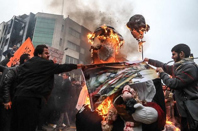 عکس/ آتش زدن تمثال ملک سلمان و اوباما
