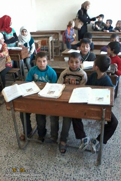 دانش آموزان شیعه سوری با وجود حملات تکفیری ها به مدرسه می روند + تصاویر