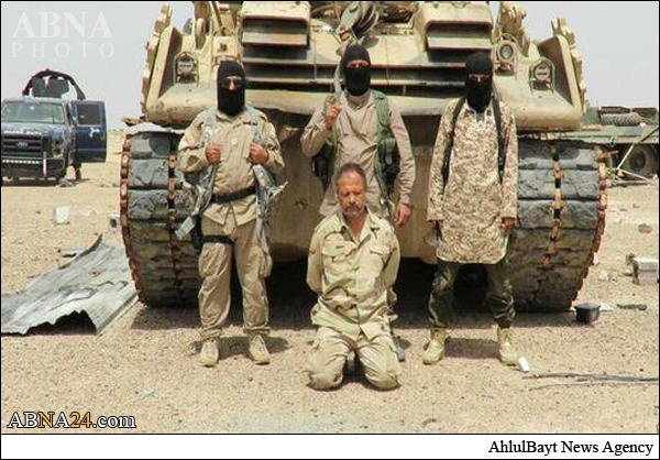 ذبح رزمنده نجفی به دست جلاد داعش + عکس