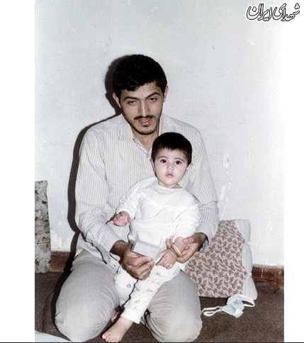 فرزند شهید زین‌الدین در بغل پدر شهیدش+عکس