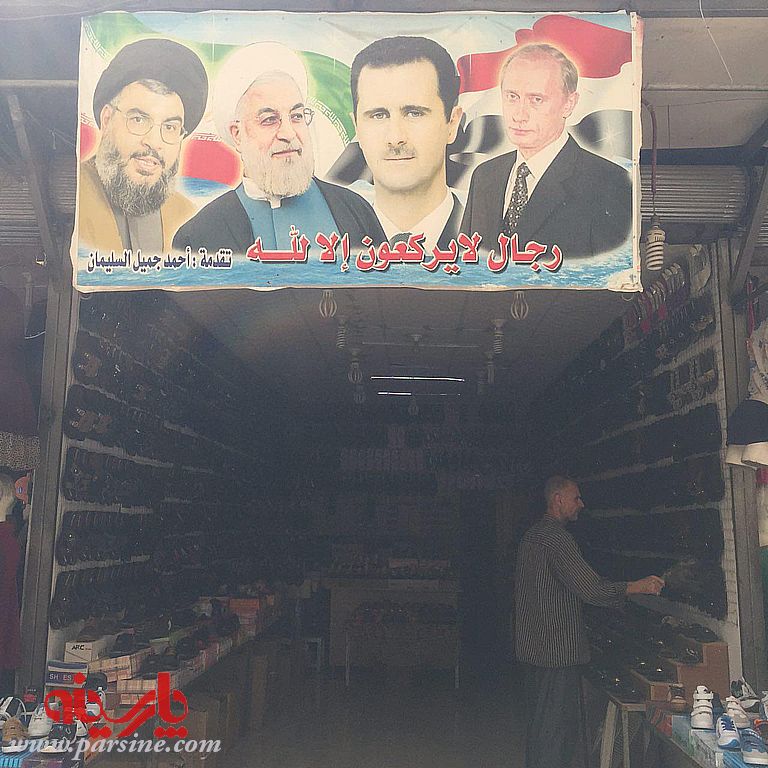 پوستر پوتین،روحانی و بشار اسد در دمشق