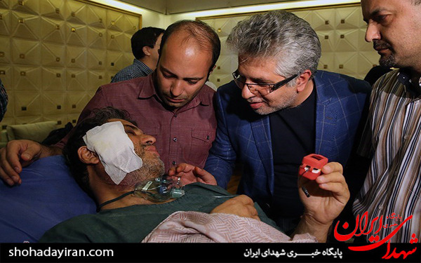 عکس/انتقال خبرنگار مجروح شده صدا و سیما در سوریه به تهران