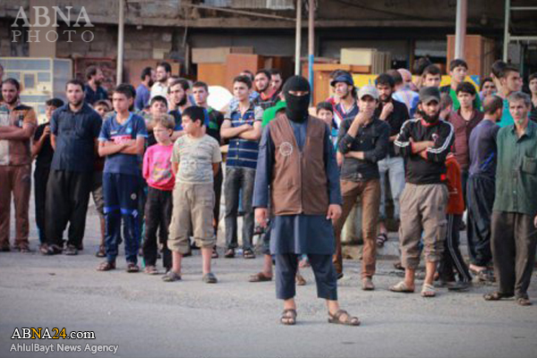 اعدام علنی جوان موصلی به دست داعش + عکس