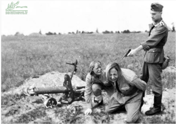 سرباز آلمانی در حال کشتن دختران روس +عکس