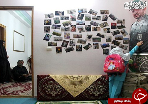 خوابیدن دختر شهید مدافع حرم بر مزار پدر+عکس