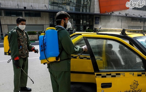 تصاویر/ضدعفونی کردن تاکسی ها و وسایل نقلیه در مشهد