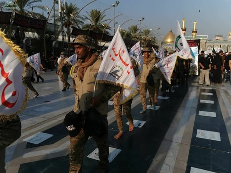تجدید پیمان مجاهدان عراقی با شهدای مقاومت در بین‌الحرمین+عکس