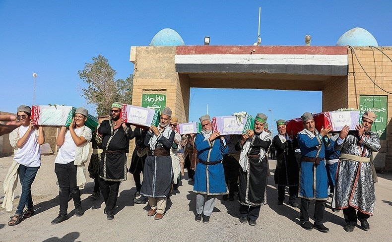 ورود پیکر ۳۵ شهید دفاع مقدس از مرز شلمچه/تصاویر