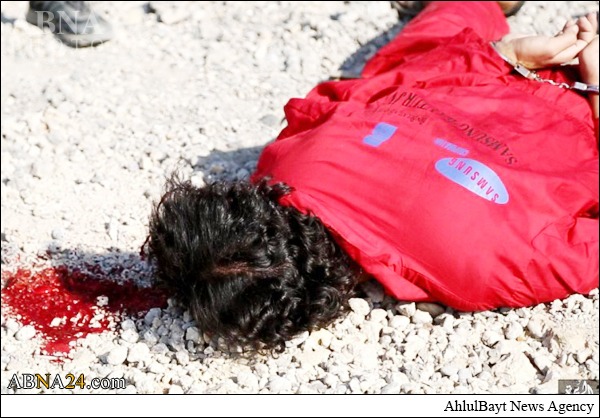 اعدام به دست کودک داعشی/عکس