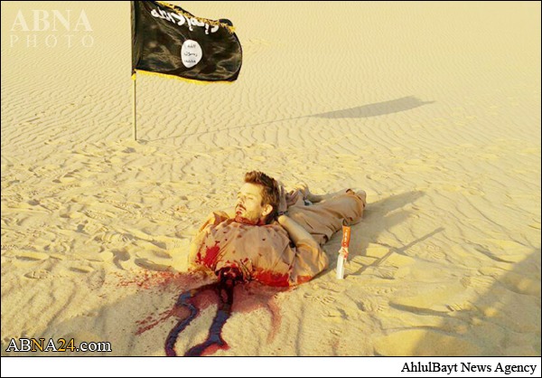ذبح مرد کروات به دست داعش + عکس