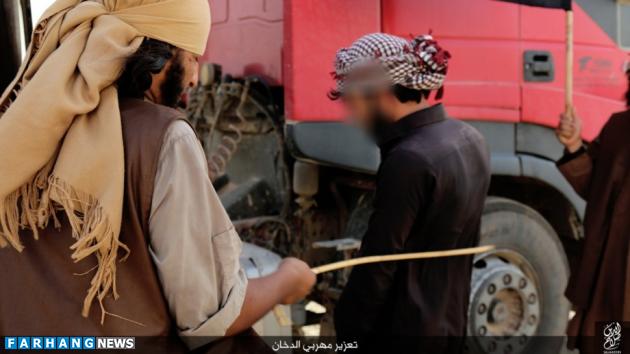 شلاق زدن قاچاقچیان سیگار توسط داعش + عکس