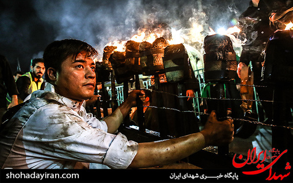 عکس/آیین سنتی مشعل گردانی عراقی های مقیم قم