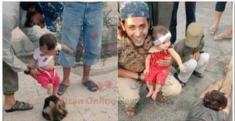 بازی یک نوزاد با سر بریده سرباز سوری +عکس