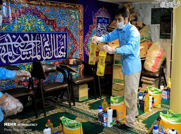 عکس/ توزیع بسته های مهربانی در مشهد