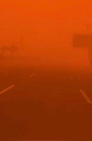 عکس/ آسمان بغداد نارنجی شد